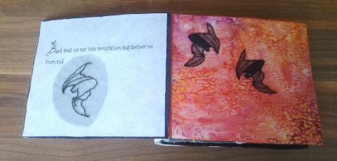 Two black bats are flying against an orange/red background. A third is flying on the same page as the text, on a white background.